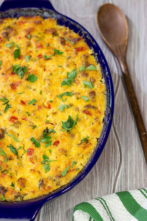 Give grits a chance! Loaded with all sorts of yummy ingredients, this Sausage and Cheese Grits Casserole is a great way to enjoy a lazy brunch or perhaps breakfast for dinner!