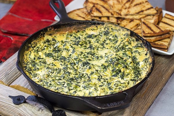 Looking for a fun appetizer recipe with an outdoor smoky twist? Fire up the grill or smoker and make a batch of this Smoked Spinach Artichoke Dip!