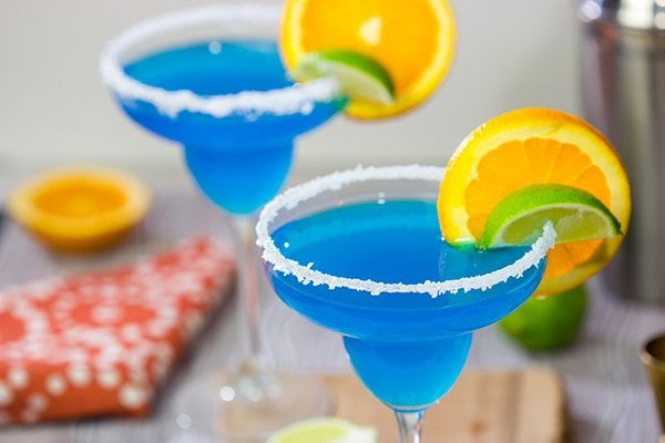 Looking for a fun twist on a classic cocktail? Pull out a bottle of blue curacao and whip up this Blue Margarita!