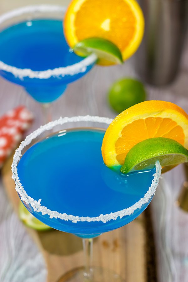 Looking for a fun twist on a classic cocktail? Pull out a bottle of blue curacao and whip up this Blue Margarita!