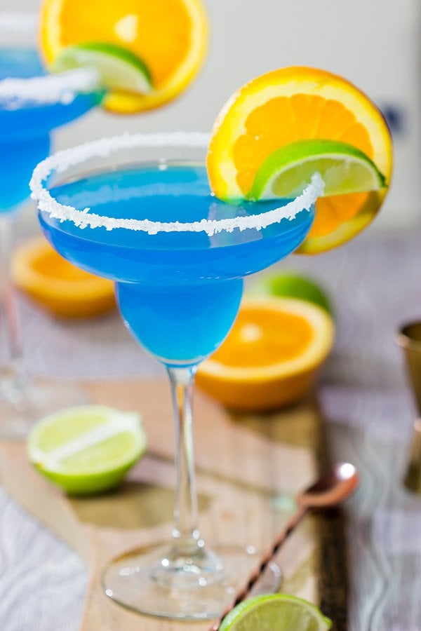 Looking for a fun twist on a classic cocktail? Pull out a bottle of blue curacao and whip up this Blue Margarita!