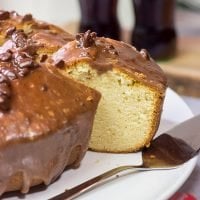 Topped with a chocolate glaze, this Coca Cola Pound Cake is a unique dessert idea! Grab a slice today!