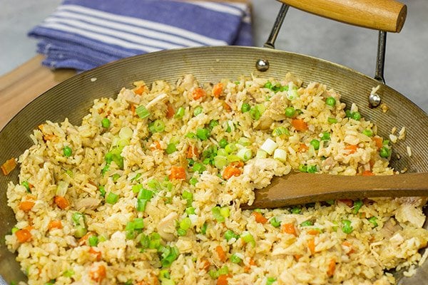 Making the rice in advance and using a rotisserie chicken makes this Easy Chicken Fried Rice a meal that comes together in just 10 minutes...yup, 10 minutes!
