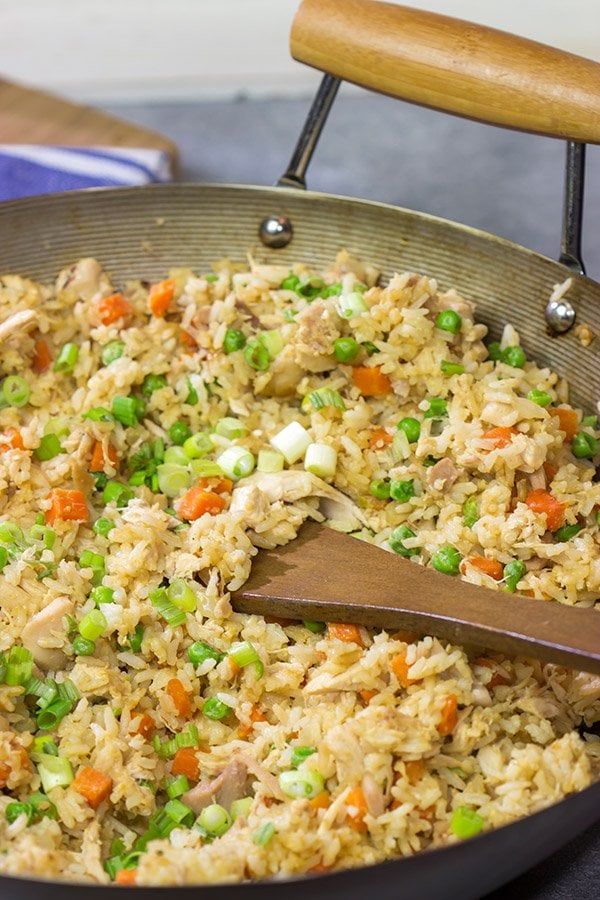 Making the rice in advance and using a rotisserie chicken makes this Easy Chicken Fried Rice a meal that comes together in just 10 minutes...yup, 10 minutes!