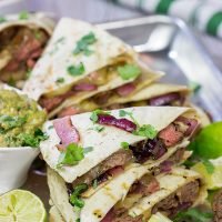 Fire up the grill! This Grilled Skirt Steak Quesadillas recipe is a tasty way to enjoy summer grilling season!