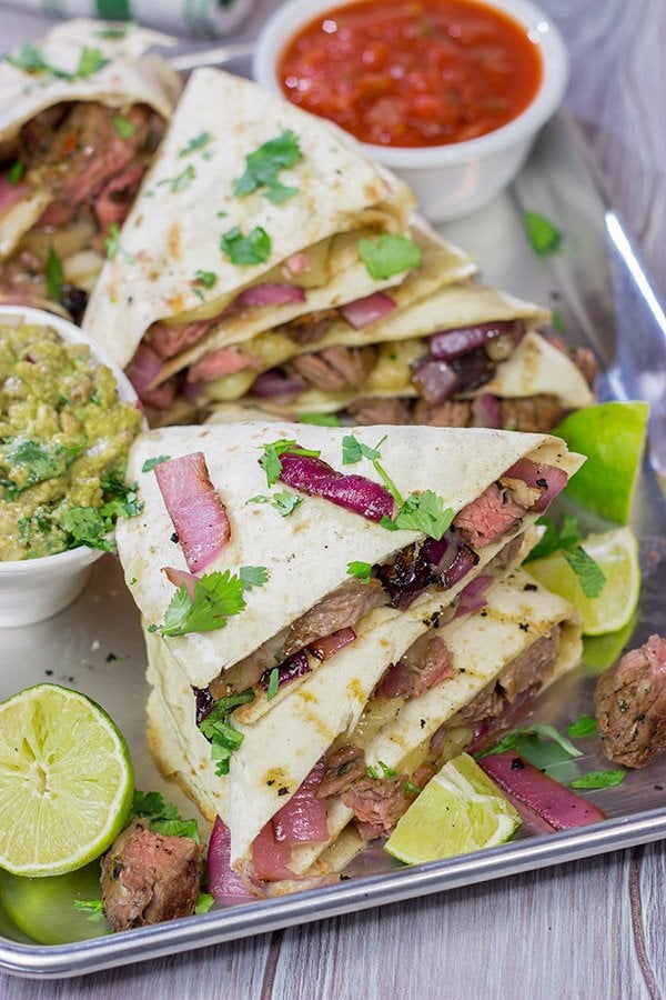Fire up the grill! This Grilled Skirt Steak Quesadillas recipe is a tasty way to enjoy summer grilling season!
