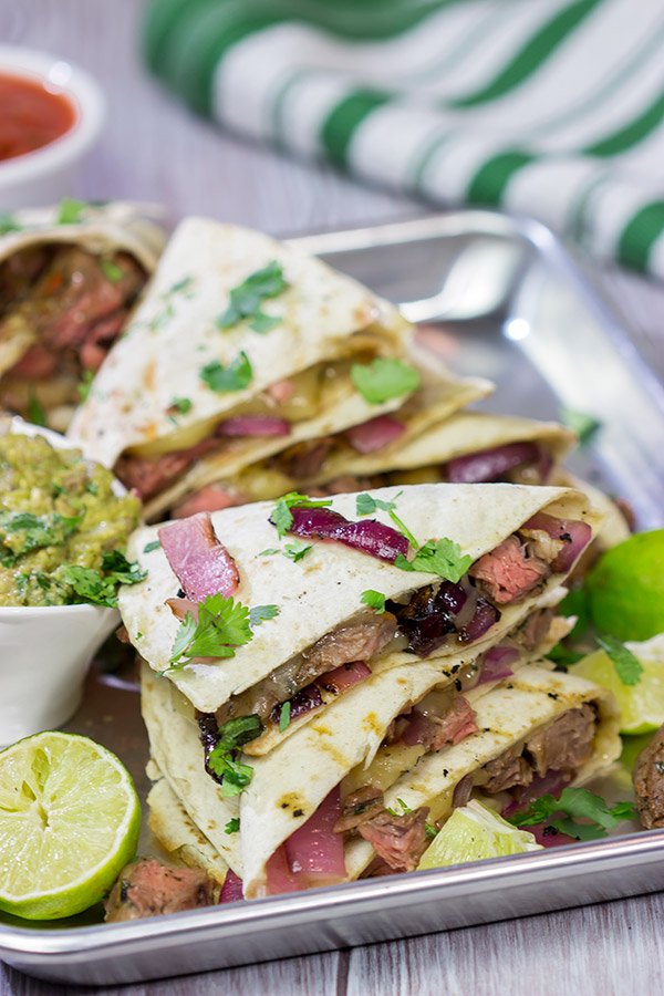 Fire up the grill! This Grilled Skirt Steak Quesadillas recipe is a tasty way to enjoy summer grilling season!