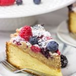 Topped with fresh berries and dusted with powdered sugar, this Mixed Berry Topped Coffee Cake is a great way to celebrate summer berry season!