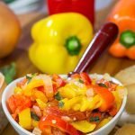 Peperonata is a classic Italian recipe using slow-cooked bell peppers, tomatoes and onions.  Eat it on crusty bread or mixed into pasta!