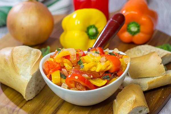 Peperonata is a classic Italian recipe using slow-cooked bell peppers, tomatoes and onions. Eat it on crusty bread or mixed into pasta!