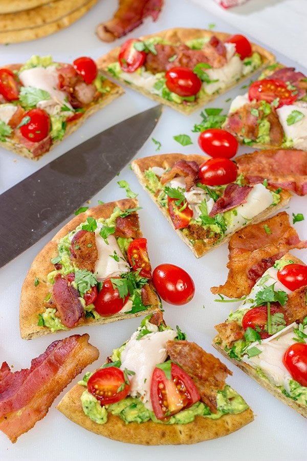 This Avocado Club Flatbread is a cross between guacamole, avocado toast and a California club sandwich - and it's delicious!