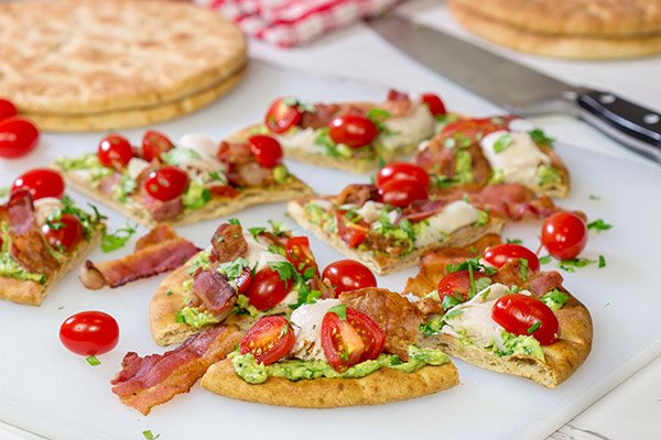 This Avocado Club Flatbread is a cross between guacamole, avocado toast and a California club sandwich - and it's delicious!