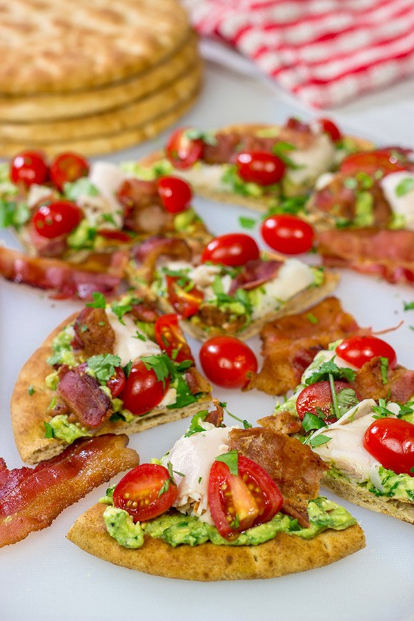 This Avocado Club Flatbread is a cross between guacamole, avocado toast and a California club sandwich - and it's delicious!