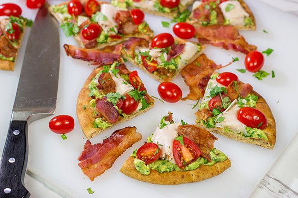 This Avocado Club Flatbread is a cross between guacamole, avocado toast and a California club sandwich - and it's delicious!