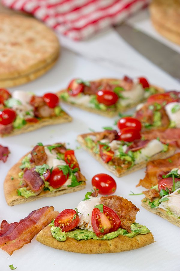 This Avocado Club Flatbread is a cross between guacamole, avocado toast and a California club sandwich - and it's delicious!