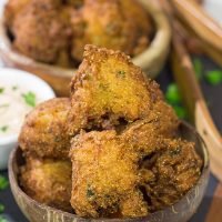 Take your fried food game to a whole new level! These Crab Cake Hushpuppies combine two favorites into one.