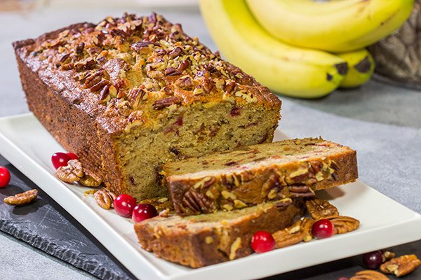Extra cranberry sauce?  Not a problem!  Mix it into this Cranberry Banana Bread for a morning treat that'll have the whole family asking for more!