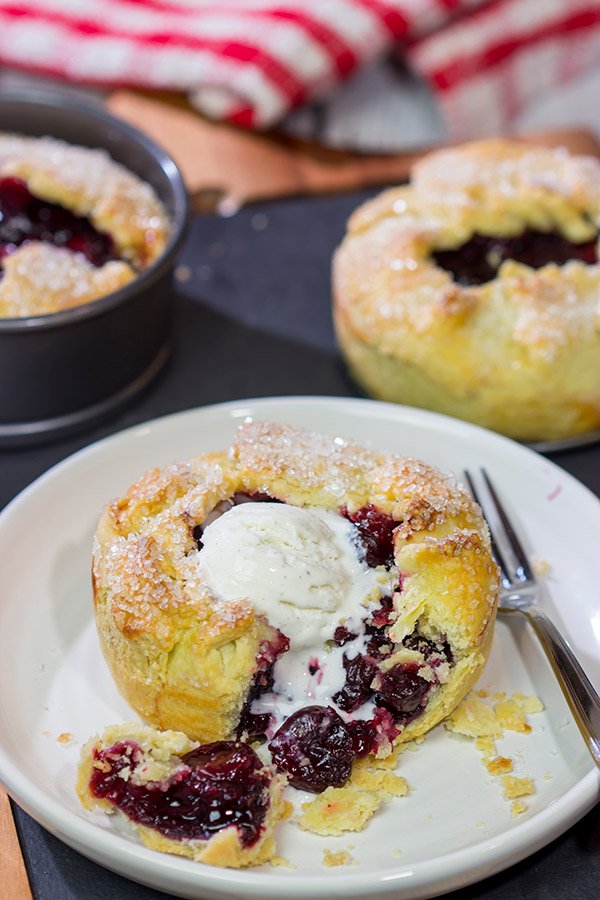 If you love a good cherry pie, then put these Individual Cherry Pies on the menu!  They're a fun way to serve up a classic dessert!