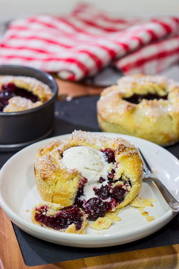 If you love a good cherry pie, then put these Individual Cherry Pies on the menu!  They're a fun way to serve up a classic dessert!