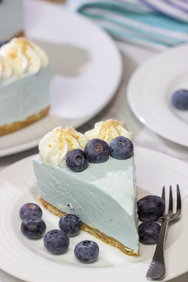 Featuring a creamy cheesecake on top of a vanilla wafer crust, this No Bake Blueberry Cheesecake is perfect for hot summer days!