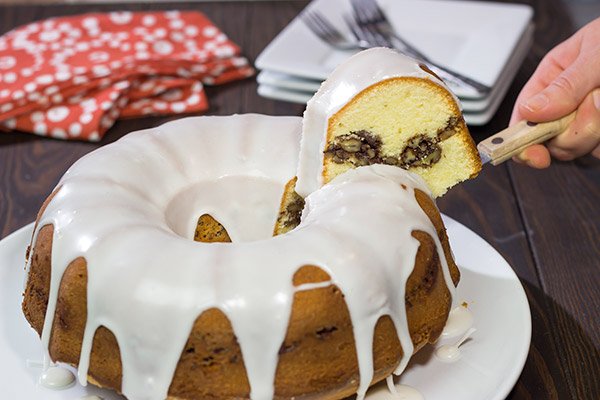 Part pound cake - part coffee cake, a Sock It To Me Cake is a delicious treat that can be served for dessert at night and brunch the next morning!