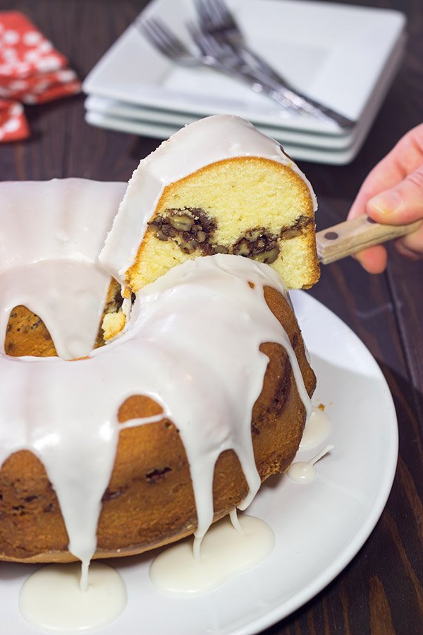 Part pound cake - part coffee cake, a Sock It To Me Cake is a delicious treat that can be served for dessert at night and brunch the next morning!