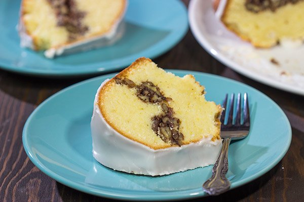 Part pound cake - part coffee cake, a Sock It To Me Cake is a delicious treat that can be served for dessert at night and brunch the next morning!