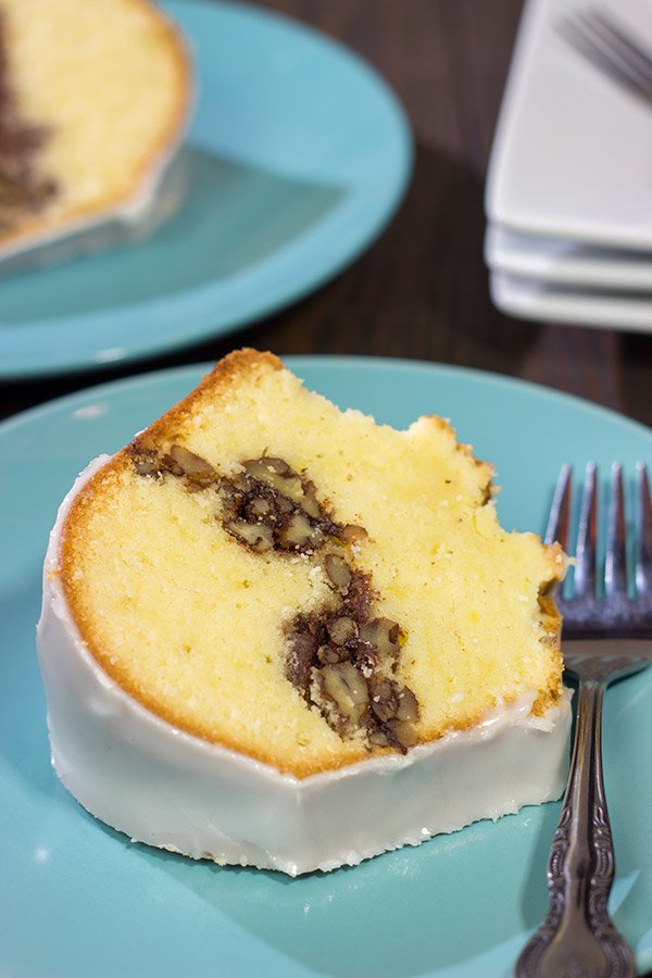 Part pound cake - part coffee cake, a Sock It To Me Cake is a delicious treat that can be served for dessert at night and brunch the next morning!