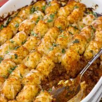 Looking for the ultimate winter comfort food meal?  This Crispy Tot Chili Casserole starts with a classic ground beef chili...and then gets topped with crispy tots!