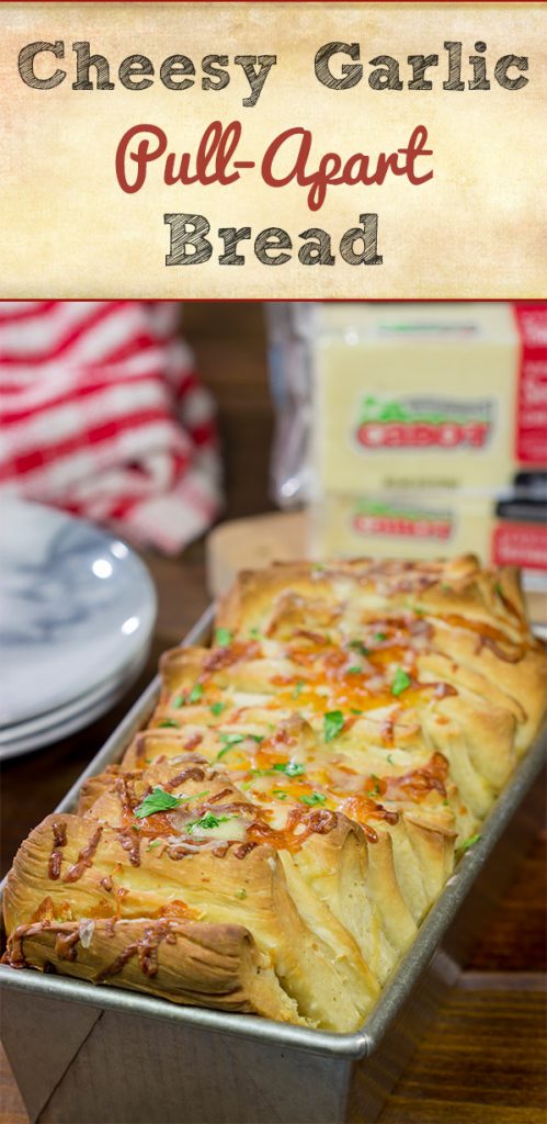Looking for a fun (and tasty!) bread recipe? Bake up a loaf of this Cheesy Garlic Pull Apart Bread...and then have fun peeling off layer after layer of cheesy bread!