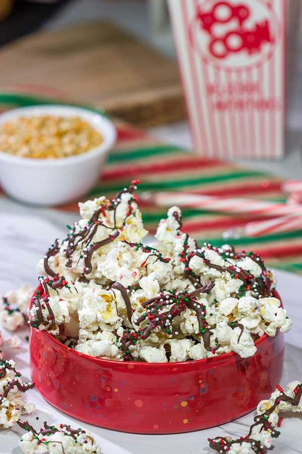 Looking for a fun holiday snack?  This Peppermint Bark Popcorn is a festive and easy recipe to make for the holidays!