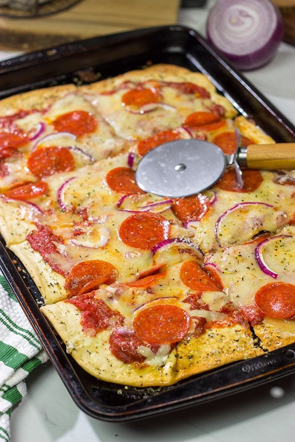 This Pepperoni Pan Pizza features an easy, homemade pizza dough that can be ready in just 20 minutes.  Make tonight a pizza night!