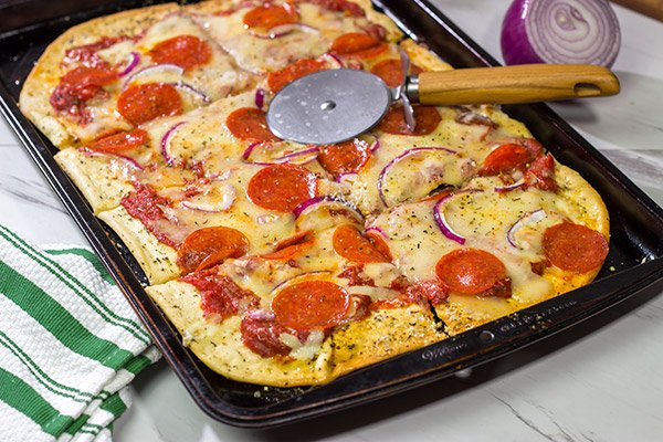 This Pepperoni Pan Pizza features an easy, homemade pizza dough that can be ready in just 20 minutes.  Make tonight a pizza night!