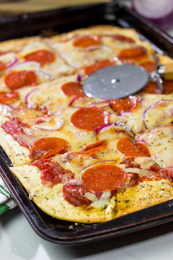 This Pepperoni Pan Pizza features an easy, homemade pizza dough that can be ready in just 20 minutes.  Make tonight a pizza night!