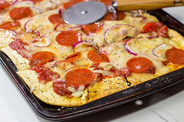 This Pepperoni Pan Pizza features an easy, homemade pizza dough that can be ready in just 20 minutes.  Make tonight a pizza night!