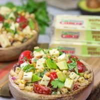 Packed with corn, beans, green chile and peppers, this Southwestern Pasta Salad packs quite a flavorful punch. It's a great summer side dish!