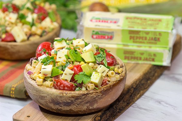 Packed with corn, beans, green chile and peppers, this Southwestern Pasta Salad packs quite a flavorful punch. It's a great summer side dish!