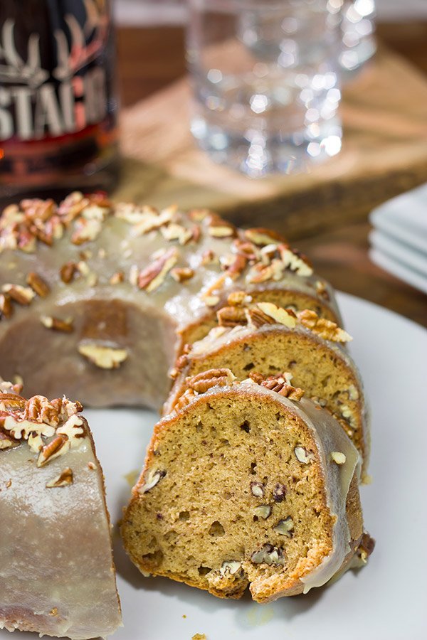 Open up a bottle of bourbon...and bake a cake!  This Bourbon Spice Bundt Cake is packed with warming baking spices.  It's a delicious way to celebrate the arrival of cooler temperatures!