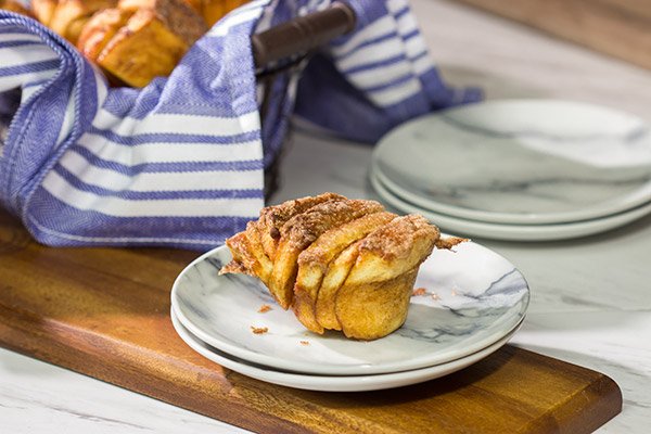 Put a sweet spin on the classic dinner roll with a batch of these Cinnamon Sugar Butterflake Rolls.  They're a fun, unique treat for brunch or dessert!