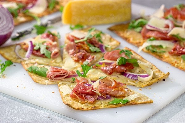 This Crispy Prosciutto Flatbread makes for a great heavy appetizer or light lunch. It tastes even better served with a glass of wine and good company!