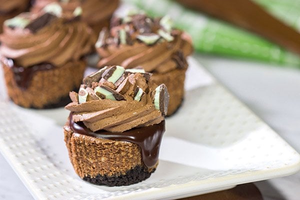 Topped with chocolate ganache and chocolate whipped cream, these Mini Chocolate Cheesecakes are perfect for the chocoholic in your life!