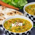 Mulligatawny Soup is a creamy, curry-flavored soup that originated in southern India.  This unique soup is delicious!  In fact, you can't eat this soup standing up - your knees buckle!