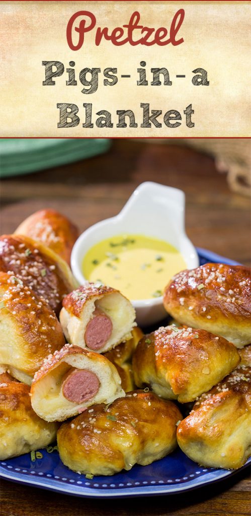 Take the classic pigs in a blanket to a new level...by adding cheese and then wrapping them in pretzel dough! Serve these Pretzel Pigs in a Blanket with a quick and easy honey mustard dipping sauce for extra flavor!