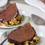 This Chocolate Amaretto Pound Cake is topped with a chocolate amaretto glaze and sprinkled with candied almonds - one bite and you'll be hooked!