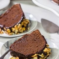 This Chocolate Amaretto Pound Cake is topped with a chocolate amaretto glaze and sprinkled with candied almonds - one bite and you'll be hooked!