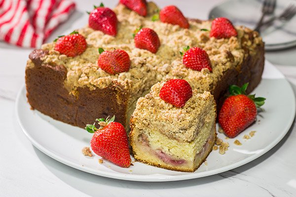 Embrace summer berry season with this Fresh Strawberry Coffee Cake! This cake is packed with juicy strawberries and topped with a cinnamon-brown sugar crumble. Happy baking!