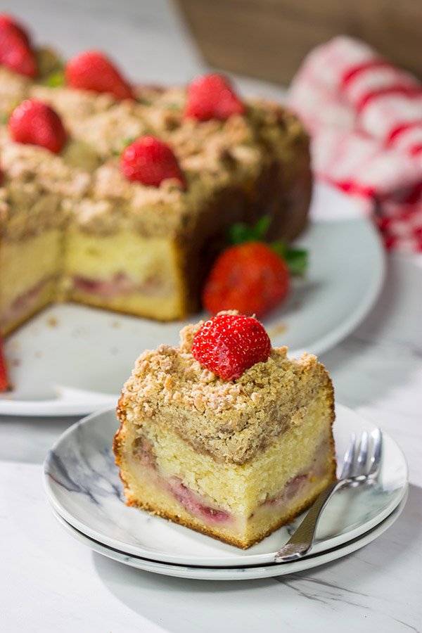 Embrace summer berry season with this Fresh Strawberry Coffee Cake! This cake is packed with juicy strawberries and topped with a cinnamon-brown sugar crumble. Happy baking!