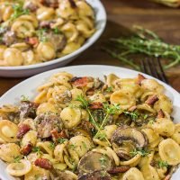 This Orecchiette with Mushroom Thyme Sauce features pasta coated with a creamy, flavorful sauce - and it's easy enough to make for a weeknight meal!