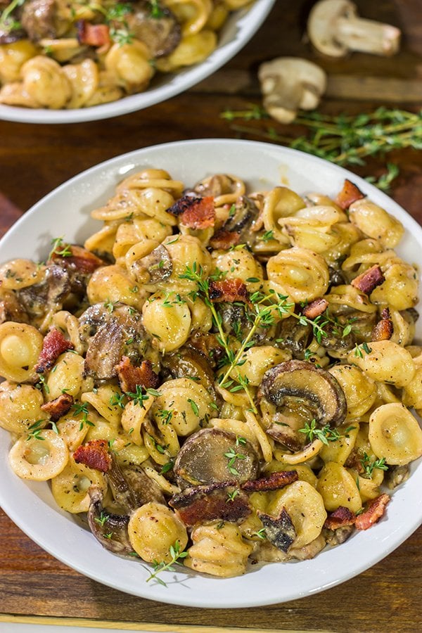 This Orecchiette with Mushroom Thyme Sauce features pasta coated with a creamy, flavorful sauce - and it's easy enough to make for a weeknight meal!