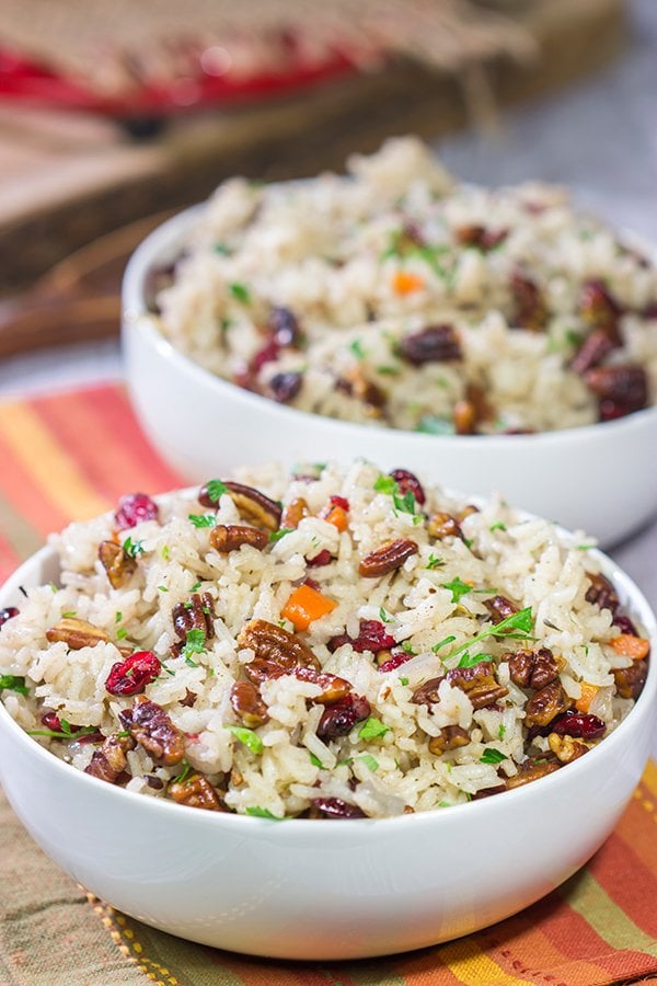 Packed with pecans, dried cranberries and carrots, this Pecan Rice Pilaf is a flavorful side dish for any season!